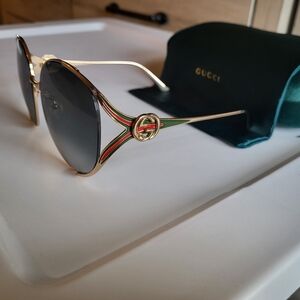 Gucci Women's Gold Frame Sunglasses with Green and Red Accents